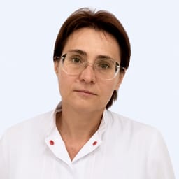 Портретный снимок врача, приём в городе Астана