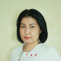 Портретный снимок врача, приём в городе Астана