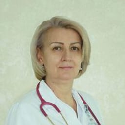 Портретный снимок врача, приём в городе Астана