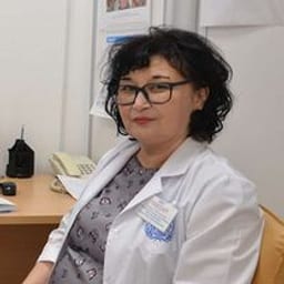 Портретный снимок врача, приём в городе Астана