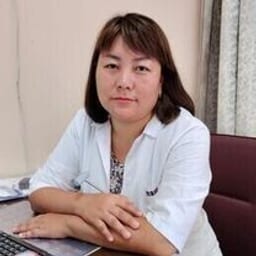 Портретный снимок врача, приём в городе Астана
