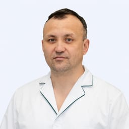 Портретный снимок врача, приём в городе Астана