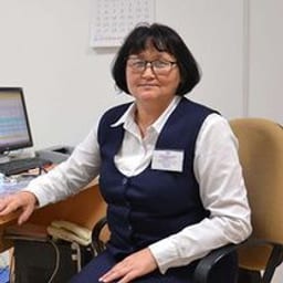 Портретный снимок врача, приём в городе Астана