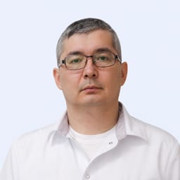 Портретный снимок врача, приём в городе Астана