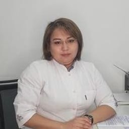 Portrait photo of a doctor, appointment in the city of Almaty Portrait photo of a doctor, appointment in the city of Almaty