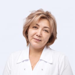 Портретный снимок врача, приём в городе Астана