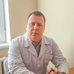 Портретный снимок врача, приём в городе Алматы
