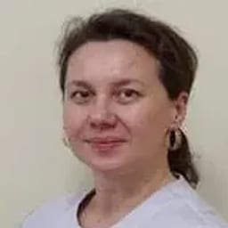 Портретный снимок врача, приём в городе Астана