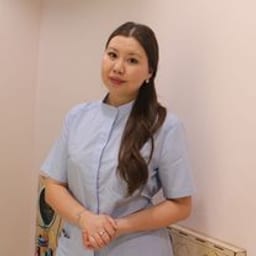 Портретный снимок врача, приём в городе Астана
