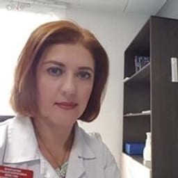 Портретный снимок врача, приём в городе Астана