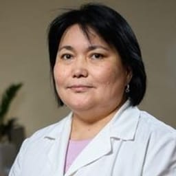 Portrait photograph of a doctor, appointment in the city of Almaty Portrait photograph of a doctor, appointment in the city of Almaty