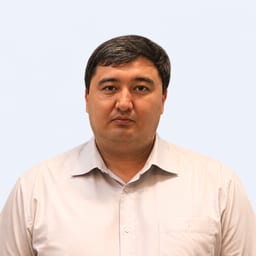 Портретный снимок врача, приём в городе Астана