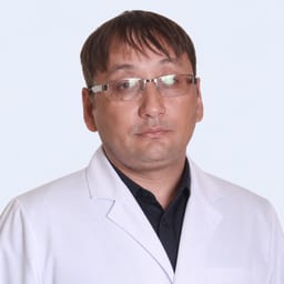 Портретный снимок врача, приём в городе Астана