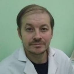 Портретный снимок врача, приём в городе Алматы