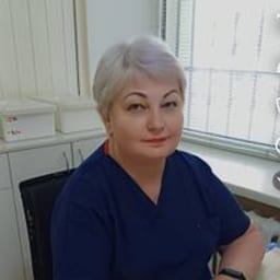 Портретный снимок врача, приём в городе Астана