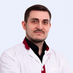 Портретный снимок врача, приём в городе Алматы