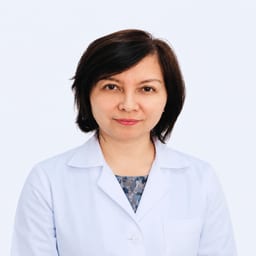 Портретный снимок врача, приём в городе Астана